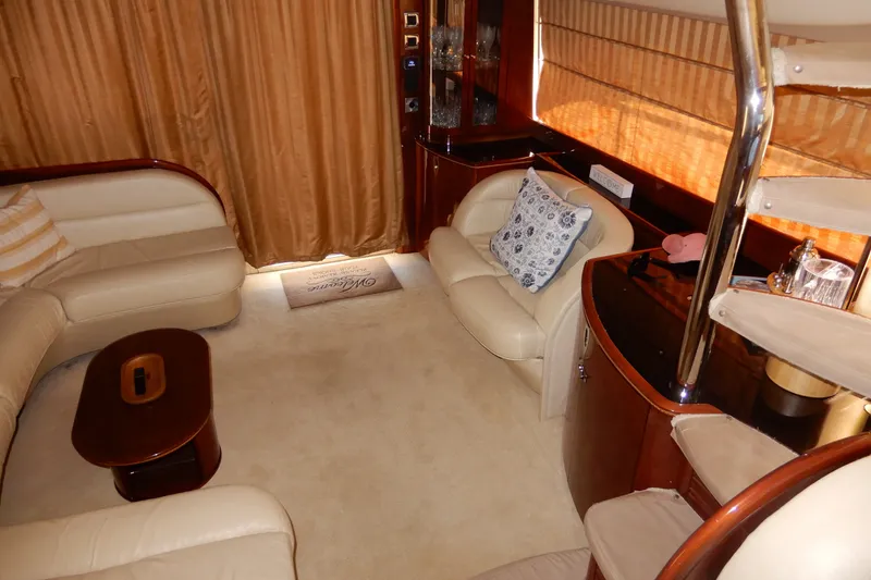 Slide: The Image of Luxurious interior of 2008 Viking Sport Cruisers 61 Motor Yacht with plush seating. - 59