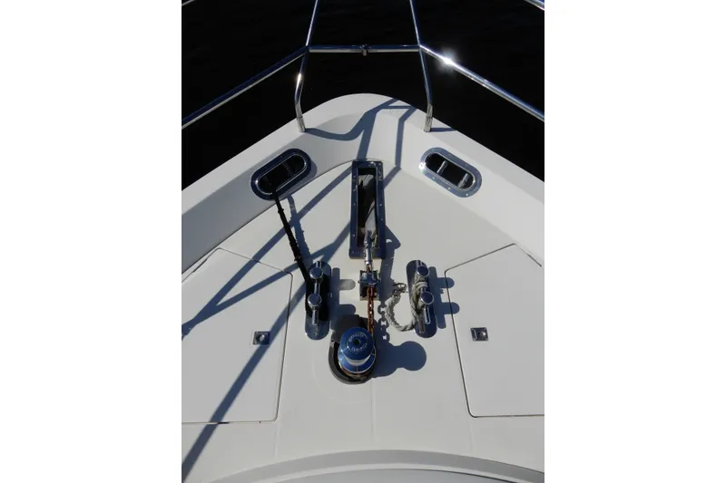 Slide: The Image of Bow deck of 2008 Viking Sport Cruisers 61 Motor Yacht with anchor equipment. - 19
