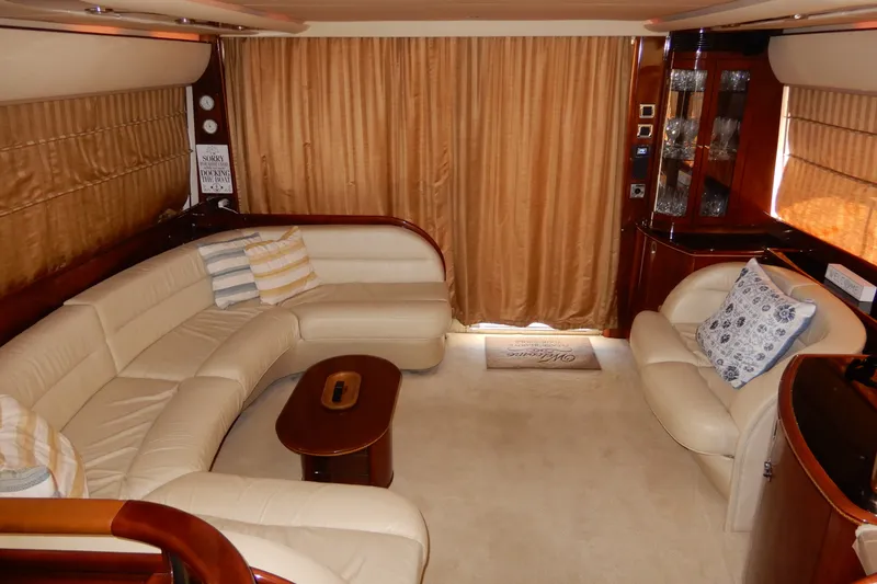 Slide: The Image of Luxurious interior of a 2008 Viking Sport Cruisers 61 Motor Yacht with plush seating. - 54