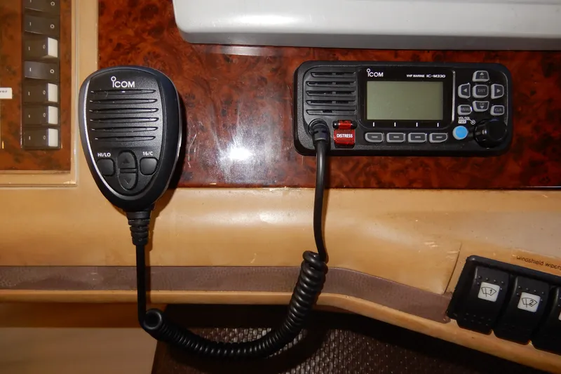 Slide: The Image of VHF marine radio on 2008 Viking Sport Cruisers 61 Motor Yacht dashboard. - 88