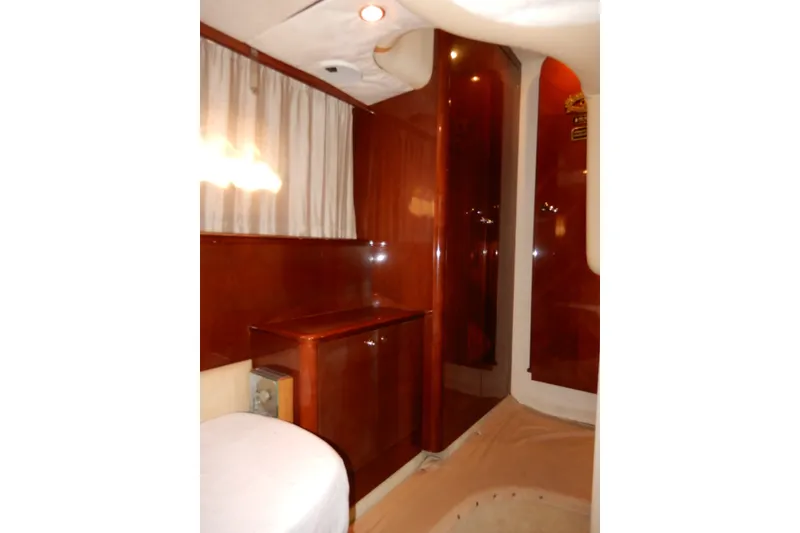 Slide: The Image of Luxurious interior of 2008 Viking Sport Cruisers 61 Motor Yacht with wood paneling. - 92