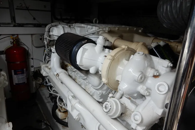 Slide: The Image of Engine room of 2008 Viking Sport Cruisers 61 Motor Yacht with visible machinery components. - 129