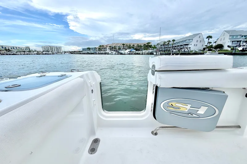 Slide: The Image of 2017 Sea Hunt Gamefish 27 boat interior with waterfront view. - 16