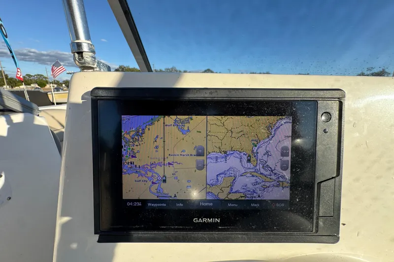 Slide: The Image of Garmin navigation display on 2021 Key West 203 DFS boat, showing nautical maps. - 24