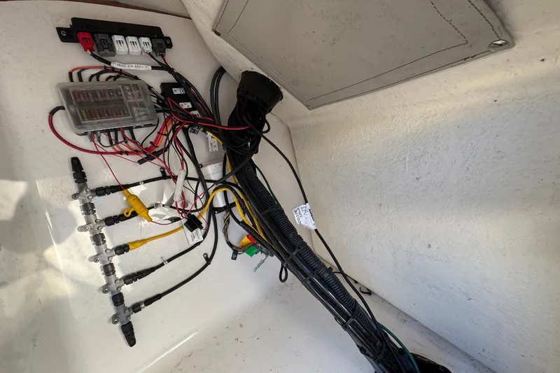 Slide: The Image of Electrical wiring setup in a 2021 Key West 203 DFS boat. - 31