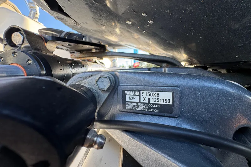 Slide: The Image of Close-up of Yamaha F150XB engine on 2021 Key West 203 DFS boat. - 58