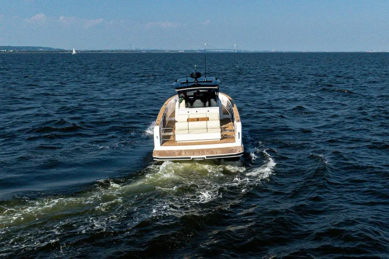 Slide: The Image of The 2025 Pardo Yachts P38 cruises on open water, featuring a sleek, modern design. - 6