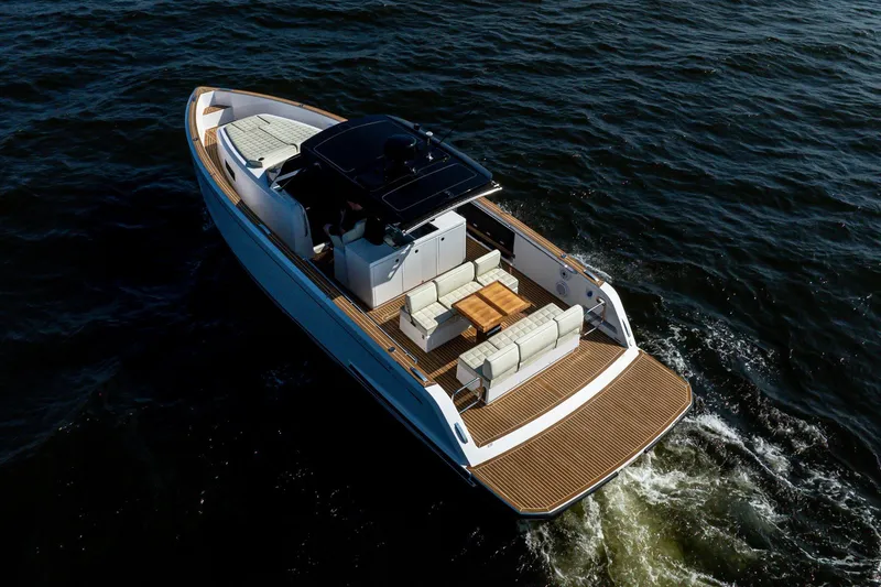 Slide: The Image of 2025 Pardo Yachts P38 cruising on open water, featuring sleek design and spacious deck. - 7