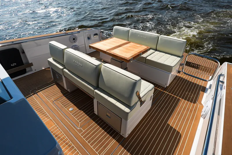 Slide: The Image of Luxurious seating area on 2025 Pardo Yachts P38, featuring elegant wood and leather design. - 12