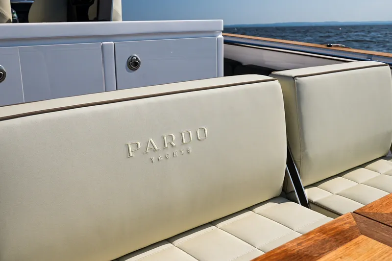 Slide: The Image of Luxurious seating on 2025 Pardo Yachts P38, featuring elegant beige upholstery. - 11