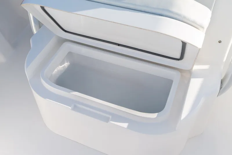 Slide: The Image of Open storage compartment on 2023 Stuart 27 Center Console boat. - 34