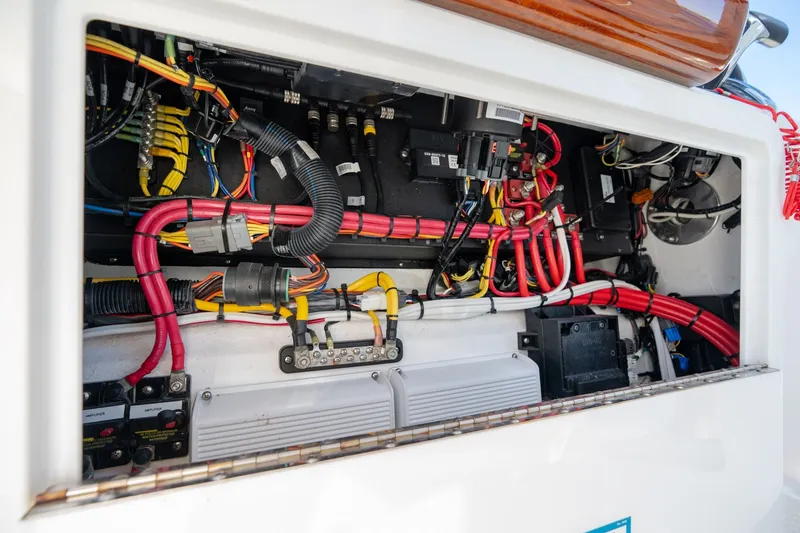 Slide: The Image of Electrical wiring inside a 2023 Stuart 27 Center Console boat. - 14