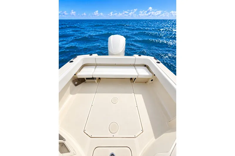 Slide: The Image of 2015 Scout 245 Dorado boat deck with ocean view and seating. - 8