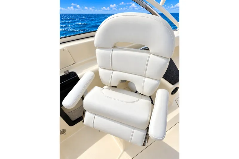 Slide: The Image of Luxurious white seat on 2015 Scout 245 Dorado boat with ocean view. - 5