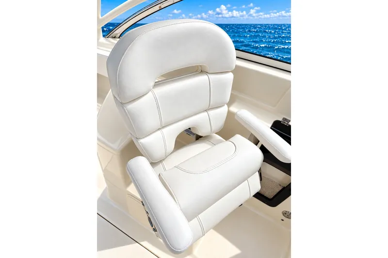 Slide: The Image of Luxurious white seat on 2015 Scout 245 Dorado boat with ocean view. - 6