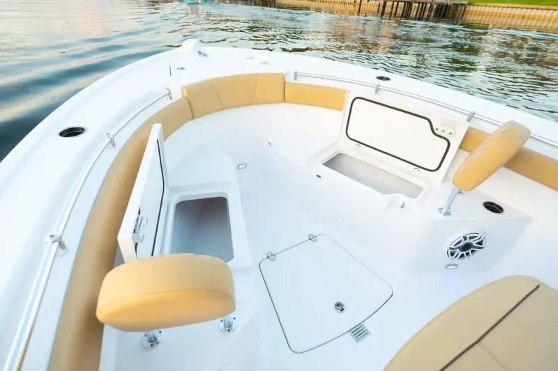 Slide: The Image of 2027 Sportsman Open 212 Center Console boat interior with storage compartments and seating. - 6