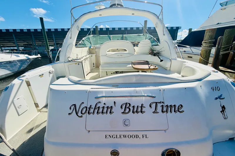 Slide: The Image of 2000 Sea Ray 410 Sundancer yacht docked, named "Nothin' But Time," Englewood, FL. - 7