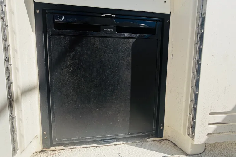 Slide: The Image of Dometic refrigerator on a 2000 Sea Ray 410 Sundancer yacht. - 34
