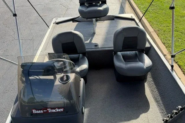 Slide: The Image of 2019 Tracker Bass Tracker Classic XL boat interior with seating and console. - 15