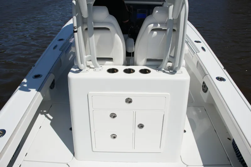 Slide: The Image of 2024 Costa Custom Boats 264HC interior with seating and storage compartments. - 39