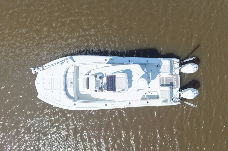 Slide: The Image of Overhead view of 2024 Costa Custom Boats 264HC on water. - 21