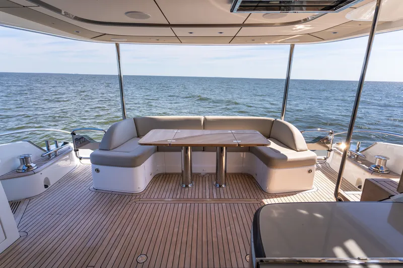 Slide: The Image of The 2025 Princess Y72 deck features an elegant seating area with an ocean view. - 7