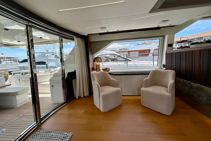 Slide: The Image of Luxurious 2024 Aicon 66 yacht interior with elegant seating and panoramic views. - 25