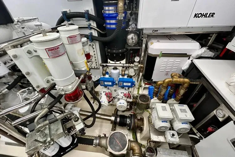 Slide: The Image of Engine room of 2024 Aicon 66 yacht with Kohler generator and Racor fuel filters. - 35