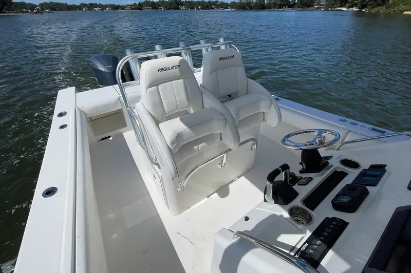 Slide: The Image of DUAL HELM CAPTAIN SEATS WITH ARM REST AND FLIP-UP BOLSTERS - 6