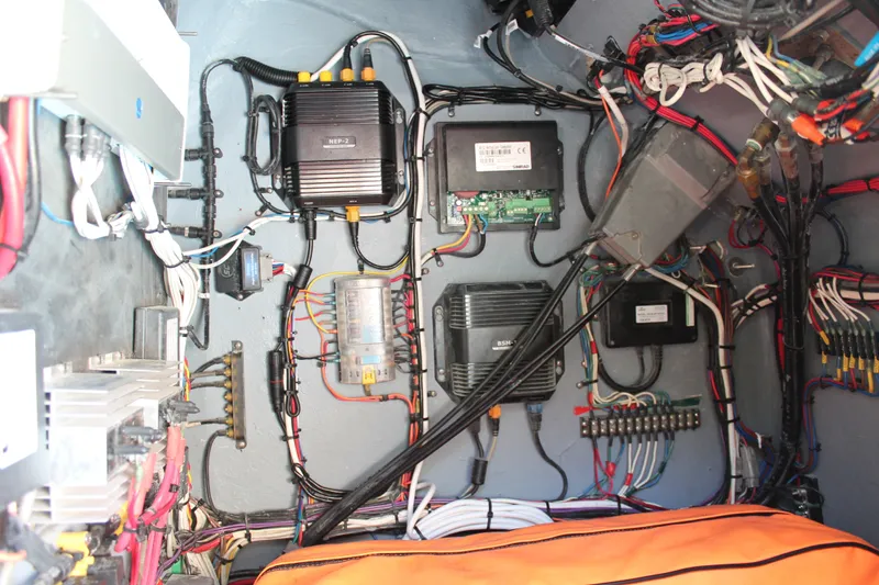 Slide: The Image of Electrical wiring and components inside a 2018 Lightning 38 Center Console boat. - 16