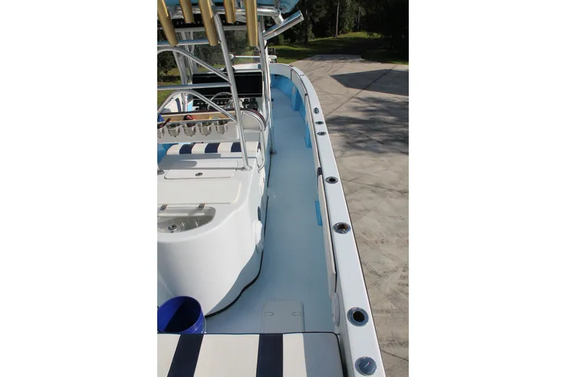 Slide: The Image of 2018 Lightning 38 Center Console boat with sleek design and spacious deck layout. - 7