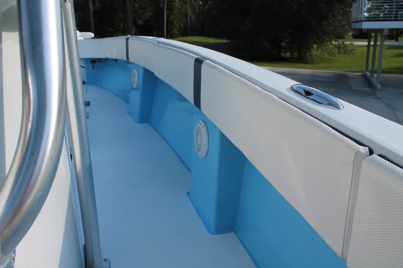 Slide: The Image of 2018 Lightning 38 Center Console boat interior with blue and white seating. - 21