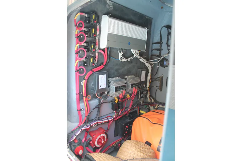 Slide: The Image of Electrical system inside 2018 Lightning 38 Center Console boat, featuring wiring and components. - 18