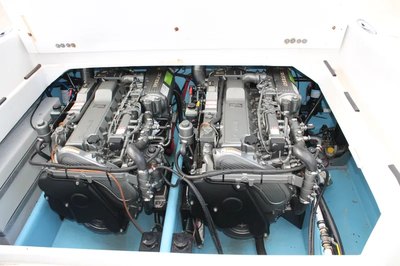 Slide: The Image of Twin engines in a 2018 Lightning 38 Center Console boat. - 19