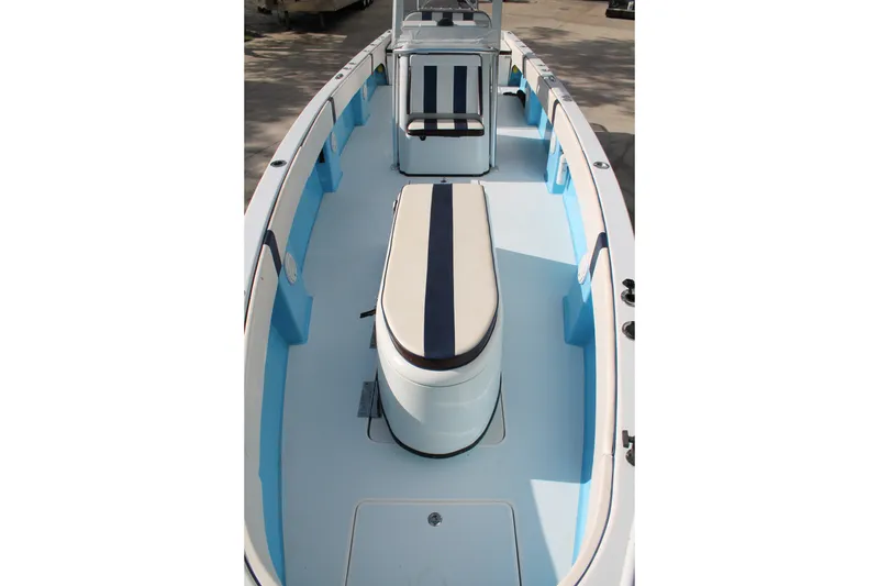 Slide: The Image of 2018 Lightning 38 Center Console boat interior with blue and white seating. - 14