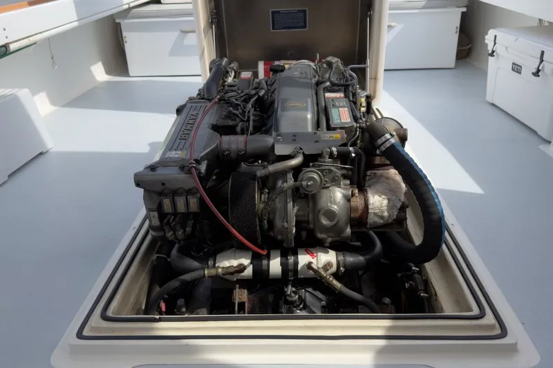 Slide: The Image of Engine compartment of a 1985 Holland 32 boat, showcasing detailed mechanical components. - 40