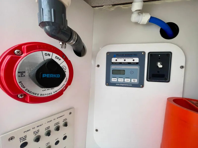 Slide: The Image of Control panel of a 2003 Formula 40 PC boat with Perko switch and wiring. - 49