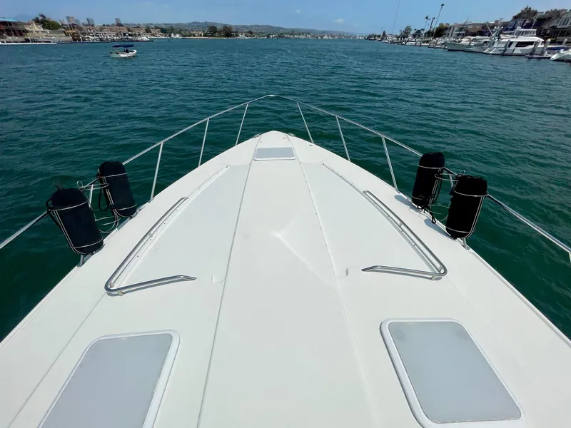 Slide: The Image of Bow view of 2003 Formula 40 PC yacht on calm water. - 42