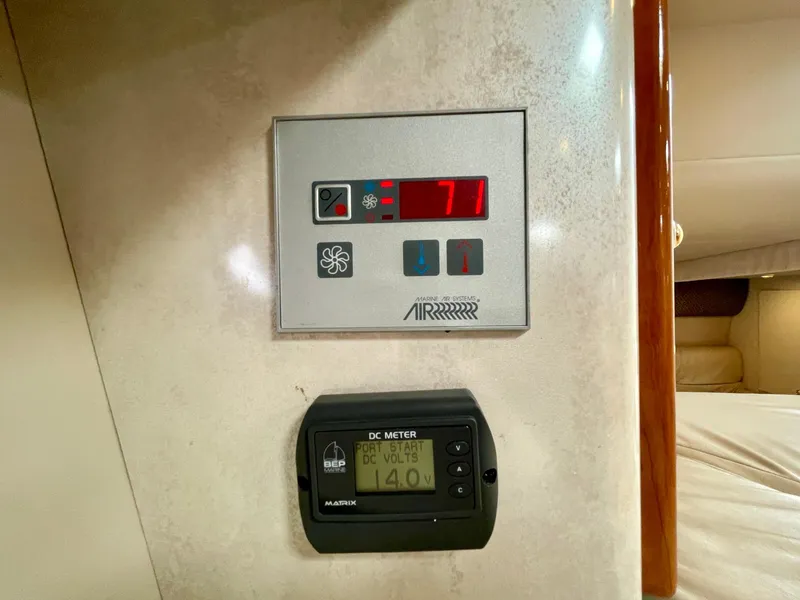 Slide: The Image of Control panel and DC meter on 2003 Formula 40 PC yacht interior. - 39