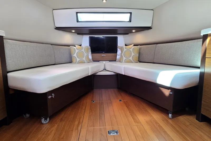 Slide: The Image of Luxurious 2016 Tiara Yachts Q44 interior with cozy seating and modern decor. - 61