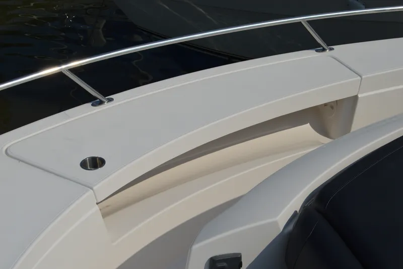 Slide: The Image of 2016 Tiara Yachts Q44 boat deck with stainless steel railing and cup holder. - 37