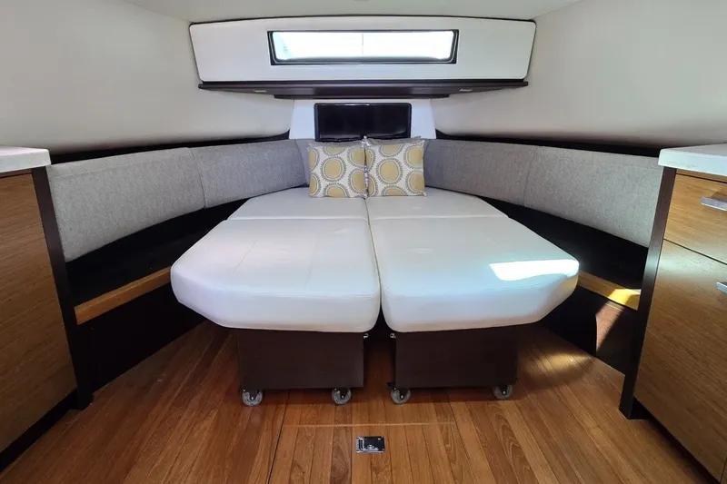 Slide: The Image of Interior of 2016 Tiara Yachts Q44 with cozy seating and modern design. - 59