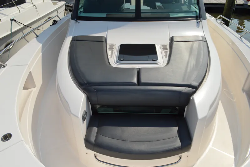 Slide: The Image of 2016 Tiara Yachts Q44 boat with sleek seating and modern design. - 34