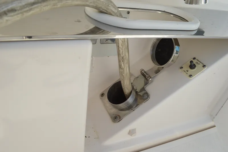 Slide: The Image of Fuel hose connection on a 2016 Tiara Yachts Q44 boat. - 27