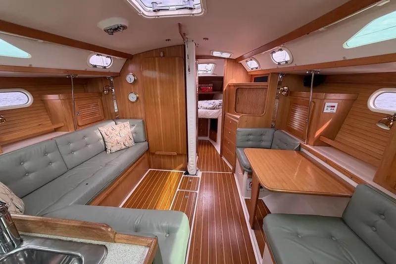 Slide: The Image of Interior of 2005 Catalina 36 MkII sailboat with wood finish and cozy seating. - 29