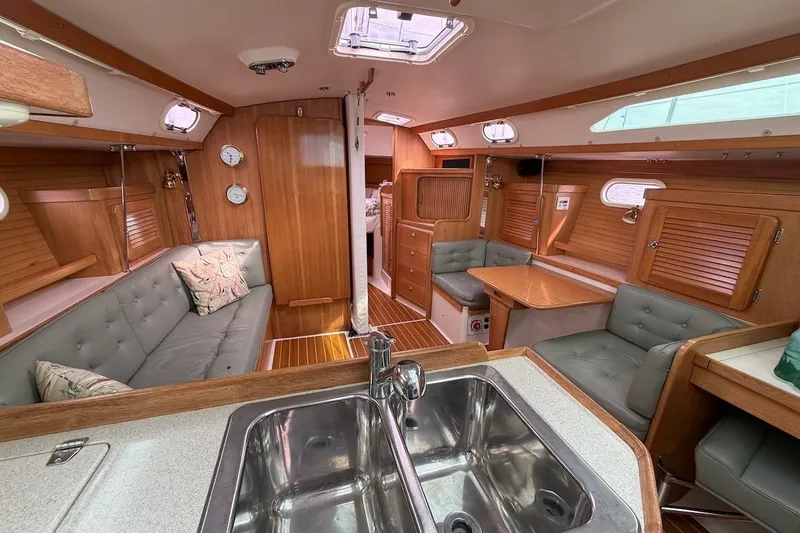 Slide: The Image of Interior of 2005 Catalina 36 MkII sailboat with wood finish and cozy seating area. - 30