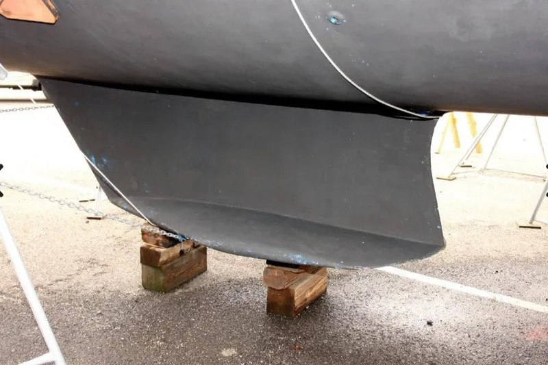 Slide: The Image of Catalina 36 MkII 2005 sailboat keel on wooden blocks in a boatyard. - 10
