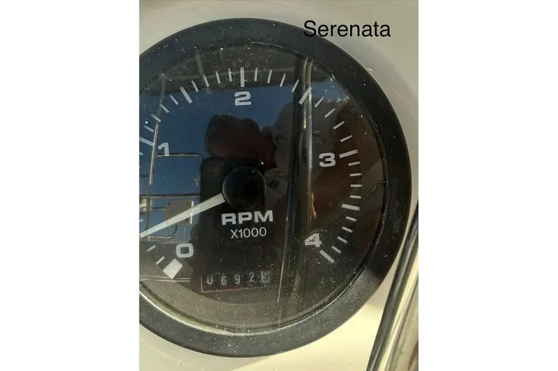 Slide: The Image of RPM gauge of a 2005 Catalina 36 MkII sailboat, showing 692.9 hours. - 9