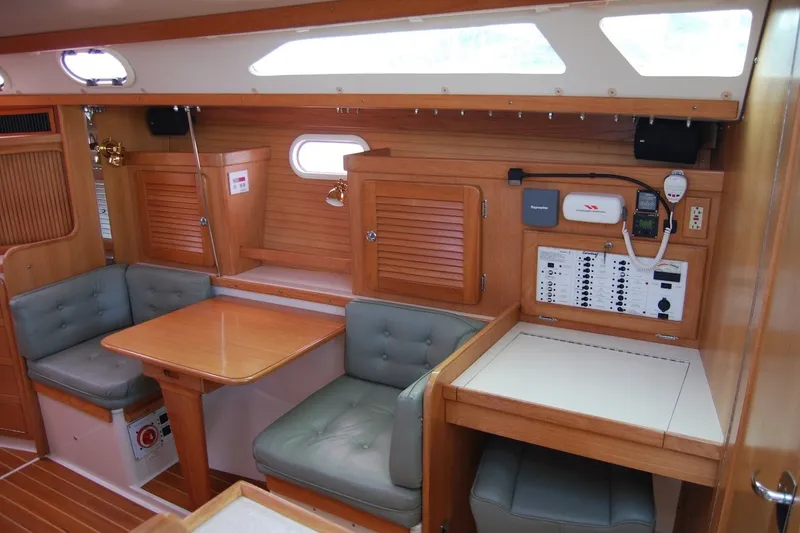 Slide: The Image of Interior of 2005 Catalina 36 MkII sailboat with wood finish and seating area. - 19