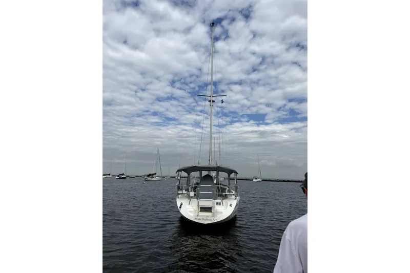 Slide: The Image of Catalina 36 MkII sailboat on water under cloudy sky, 2005 model. - 1